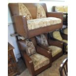 A vintage stylish brown leatherette three piece suite comprising a two seat sofa and two armchairs