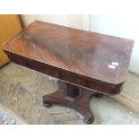 A Victorian mahogany card table on hexagonal column quatrefoil base