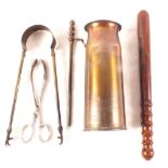 A brass shell case converted into a fire irons holder with hardwood truncheon