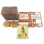 A small 'military' wooden box with two 'Trench Art' ashtrays and three books including 'The