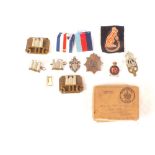 A group of four WWII medals including France and Germany Star with various insignia