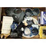 A collection of Police related items including mugs,