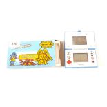 A pocket size Nintendo MV-64 Gold Cliff with original box and paperwork