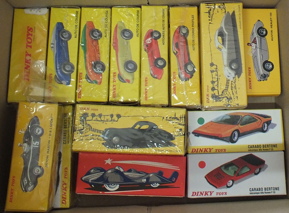 A box of fourteen sports and racing cars
