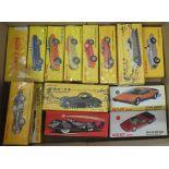 A box of fourteen sports and racing cars