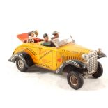 A Meccano tin plate Tin Lizzy with driver and three passengers