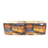A boxed Hornby Railways Stephensons Rocket set plus to boxed G104 coaches