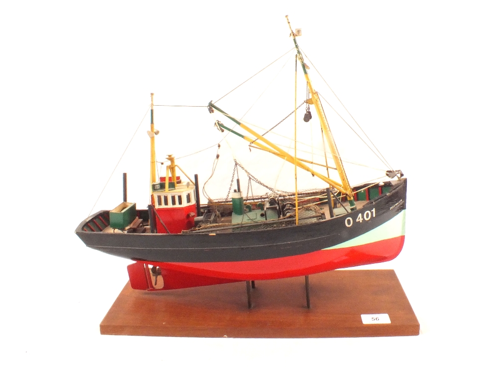 A wooden hulled model trawler