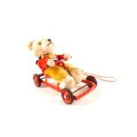 Chiltern Toys soft Teddy bear on go kart,