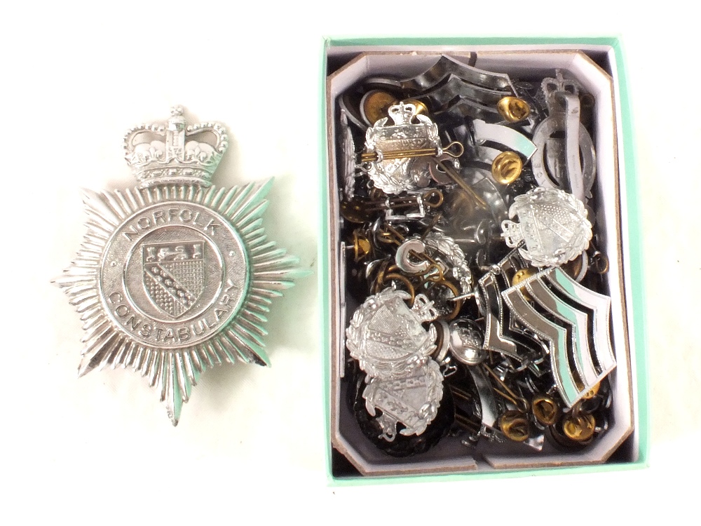 A quantity of Police insignia