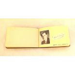 A 1950's autograph book of mainly track athletes including Roger Bannister and Mcdonald Bailey,