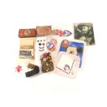 A box of mixed military related items including badges,
