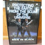 A framed film poster Men in Black,