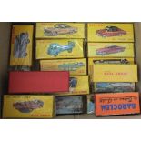 A box of fifteen Atlas Dinky cars