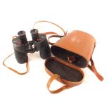 A cased pair of military 7x50 binoculars marked R.E.L.