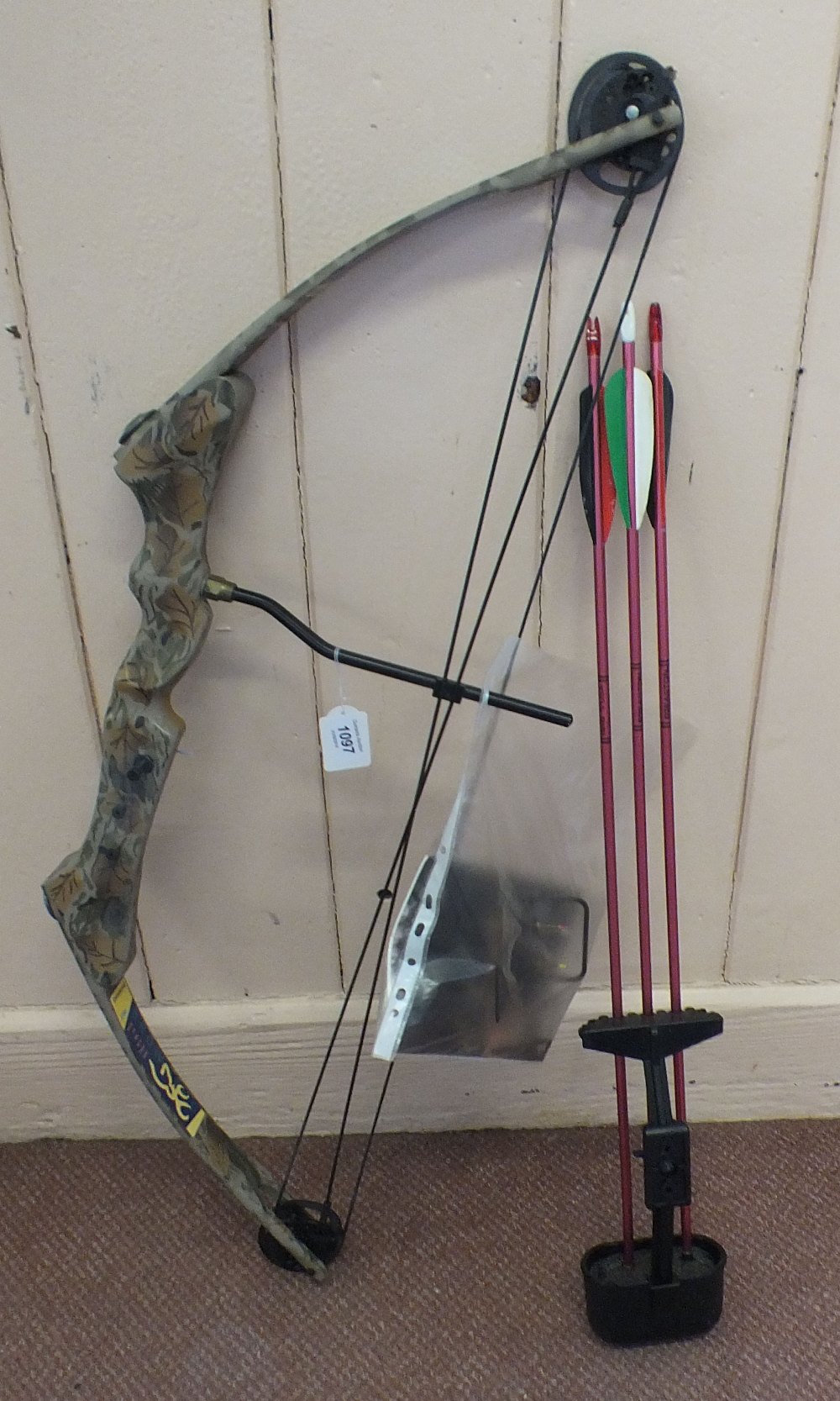 A compound bow by Browning with accessories etc