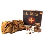 A first aid tin marked L.M.S.