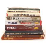A quantity of books on shooting and medals etc