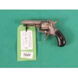 A 7mm pin-fire six shot revolver,