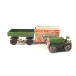 A boxed Minic tractor (one flap detached) and green trailer