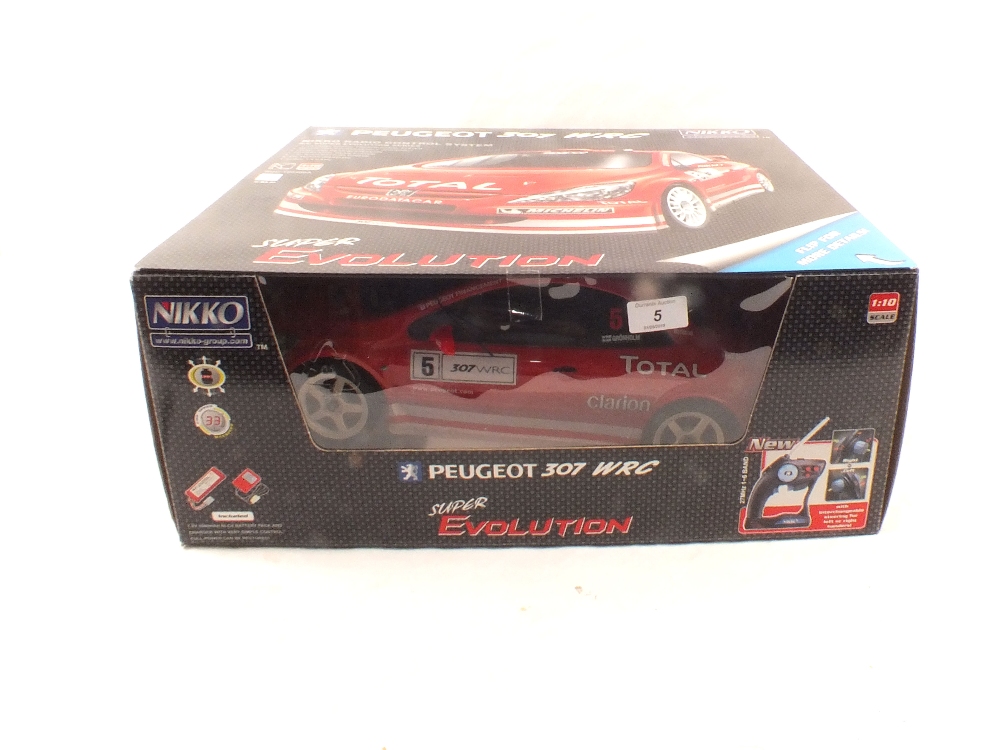 A boxed Nikko radio controlled Peugeot 307 WRC