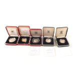 Five cased silver proof coins including commemorative medal, 1994 two pound, 1997 two pound,