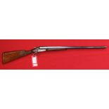 A 12 bore side-by-side N/E shotgun by Baikal, in very good overall condition with excellent bores,