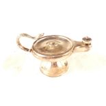 A silver Aladdins lamp cigarette lighter with snake handle,