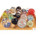 A varied collection of paperweights