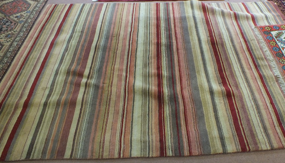 A machine made striped carpet,