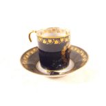 A 19th Century Sevres blue and gilt coffee can and saucer with Chateau Des Tuileries mark,