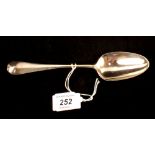 A silver dessert spoon,