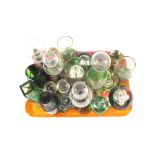 Items of green glass including paperweights,