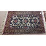 A Belouchi blue ground rug,