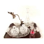 A silver plated and glass bird head claret jug,