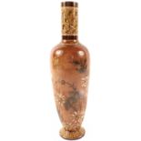 A Martin Bros narrow neck vase with incised chrysanthemum decoration, signed R.