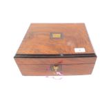 A Victorian walnut and ebonised work box