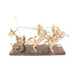 A white metal Roman Chariot with four horses on black marble base