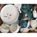 A large quantity of Denby Green Wheatsheaf china in a variety of shapes