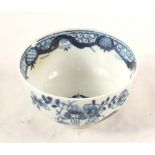 A Lowestoft Fence pattern blue and white tea bowl (top rim chip)