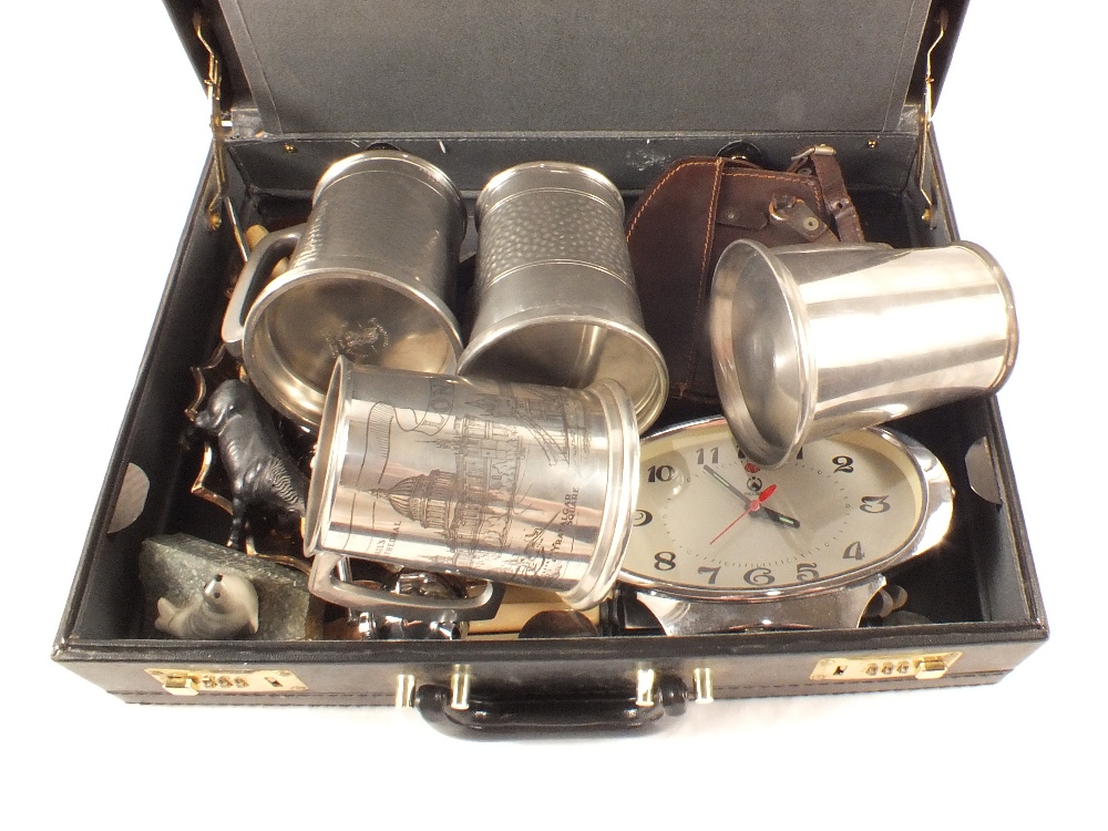 Two briefcases containing Bell & Howell cine camera, pewter,