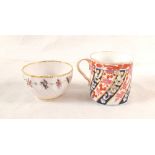 A Derby floral and fluted tea bowl plus a Spode Queen Charlotte pattern coffee can