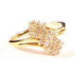 An 18ct gold 1/2ct diamond cluster ring,