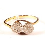 An 18ct gold double daisy diamond cluster ring,