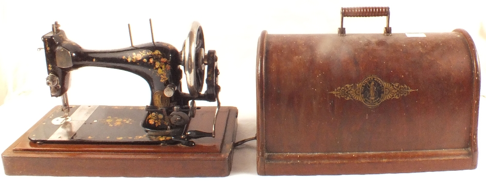 A Singer sewing machine, oak barometer, sundries,