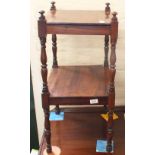 A reproduction mahogany two tier whatnot