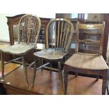 Two hoop back hard seat chairs and one other