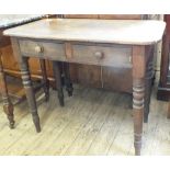 A Victorian pine table with oak top and two drawers