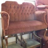 An Edwardian style twin seat sofa with dark red upholstery (matches lot 1050)