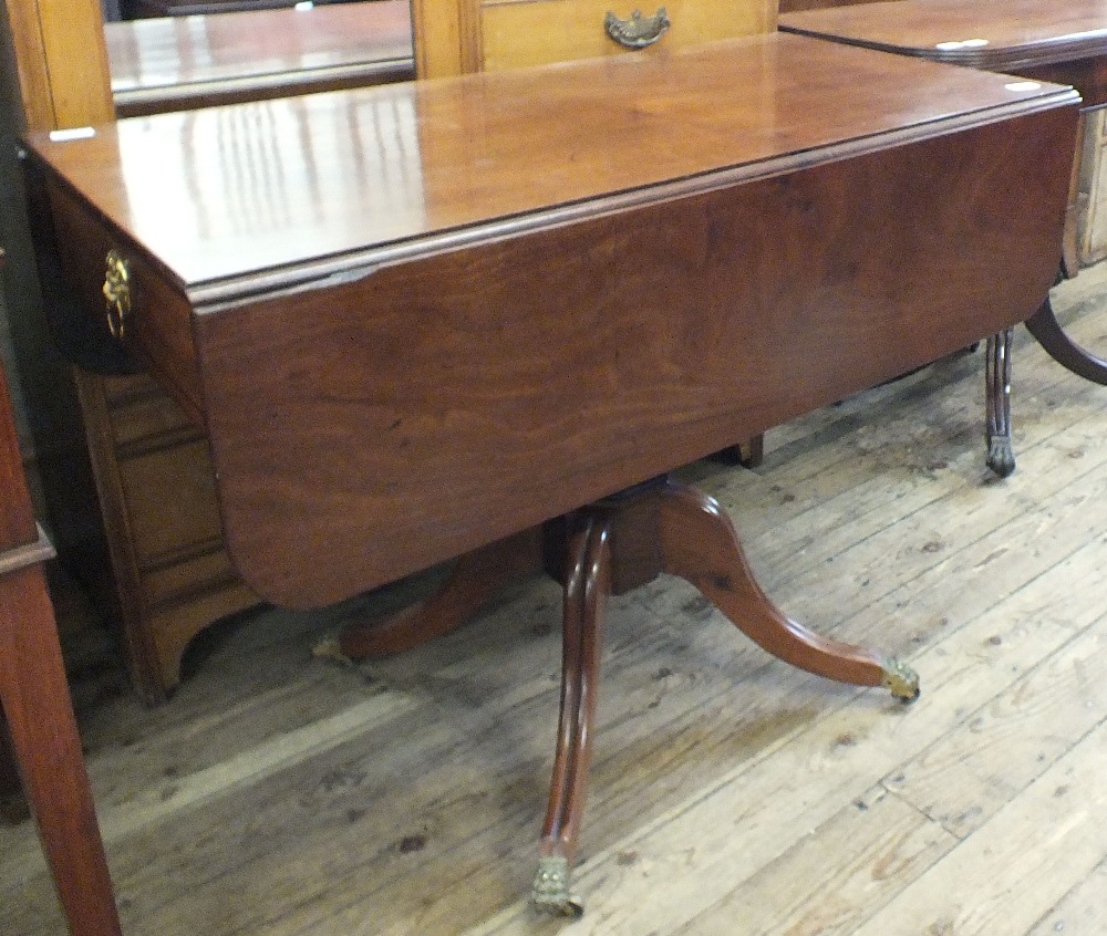 A 19th Century mahogany drop leaf dining table